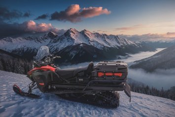 BRP Ski-Doo Expedition with a rear cargo box in the mountains